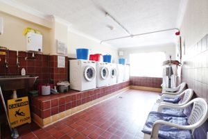 COMMUNAL LAUNDRY ROOM- click for photo gallery